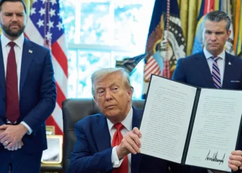 Veteran burns American flag in front of White House on day of controversial Trump executive order